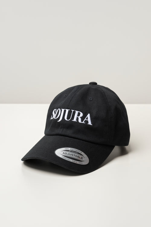 black ballcap with sojura logo embroidered across the front
