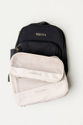 Sojura black Adella backpack with a small sojura compression packing cube and a large sojura compression packing cube as a bundle